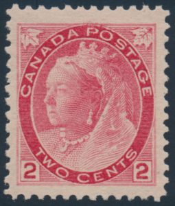 Lot 186 Canada #77 1899 2c carmine Queen Victoria Numeral, Die I, mint never hinged, with large, even margins, very fresh and extremely fine.