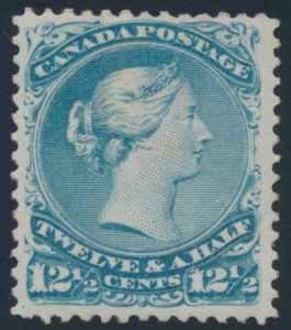 Lot 51, Canada 1868 twelve and a half cent milky blue Large Queen with no outer frameline, VF hinged, sold for $1035