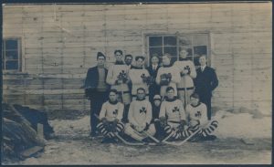 Lot 1471, "Three Leaf Clovers", one of two vintage Canadian Hockey Team real photo postcards