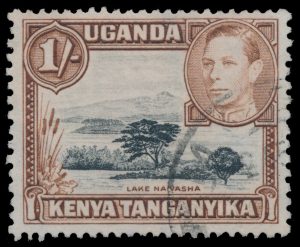 Lot 447, Kenya, Uganda and Tanganyika 1938 1/- black and yellowish brown King George VI with "mountain retouch" variety, VF used